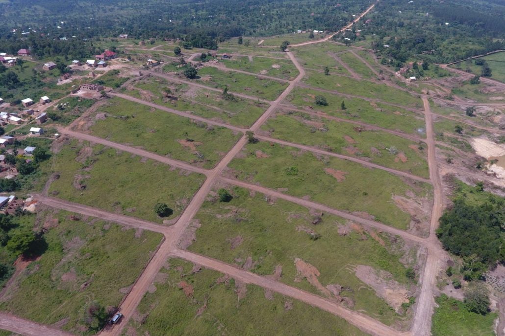 How can foreigners own land in Uganda